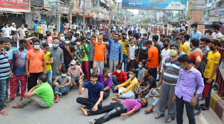 দোকান খোলার দাবিতে রাজশাহীর ব্যবসায়ীদের বিক্ষোভ দোকান খোলার দাবিতে রাজশাহীর ব্যবসায়ীদের বিক্ষোভ