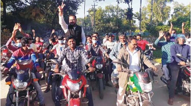 নাঙ্গলকোটের হেসাখাল ইউনিয়ন চেয়ারম্যান প্রার্থী এয়াকুব আলী রায়হানের মোটর শোভাযাত্রা